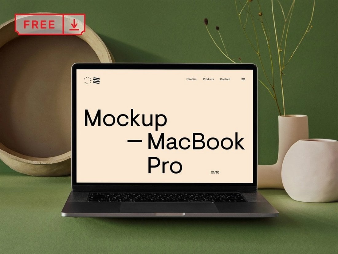 Free MacBook Pro with Vase Mockup